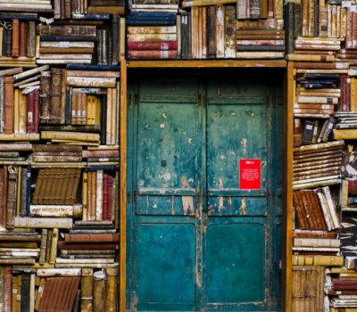 Book-covered walls. Photo by Eugenio Mazzone on Unsplash